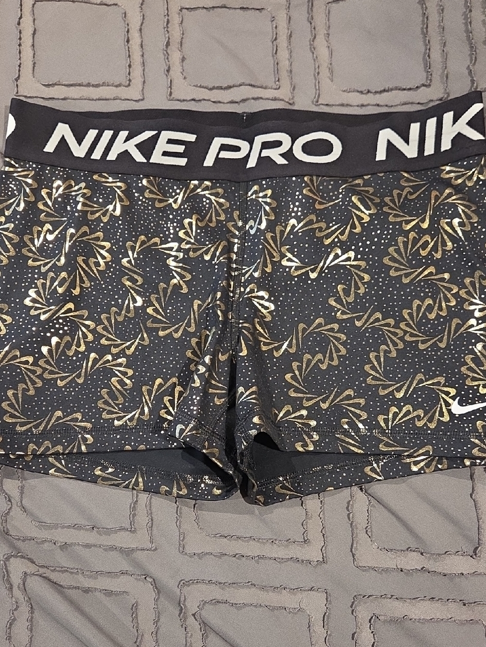 Nike Pro Women's Black Shorts with Gold Spiral Print